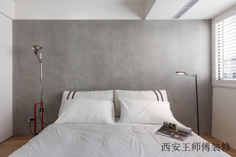 简约卧室水泥背景墙装饰图