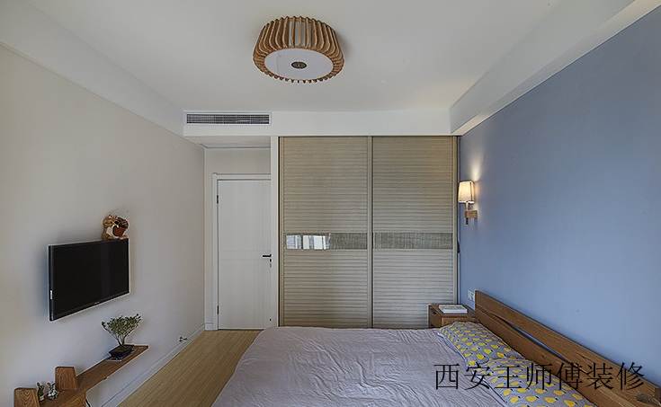 简约设计风格卧室蓝色背景墙装饰效果图