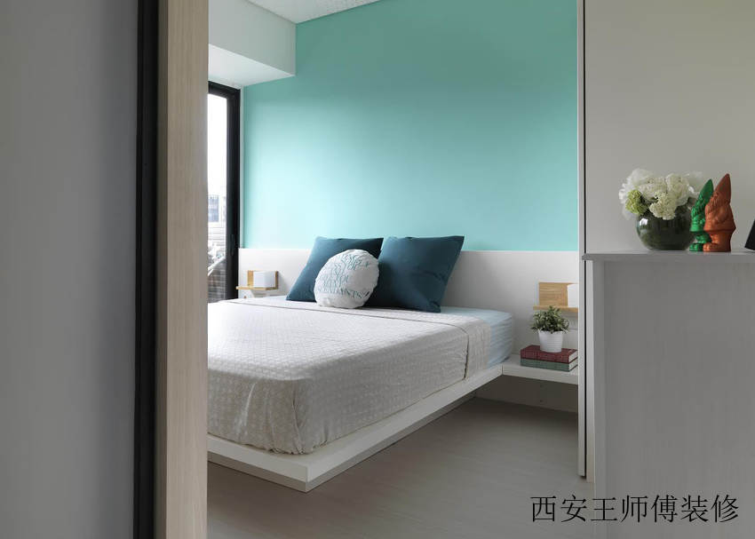 清新简约卧室绿色背景墙装饰图